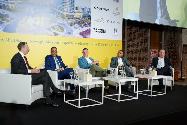 Roger Allen moderating a panel session on branding at GIOHIS 2025